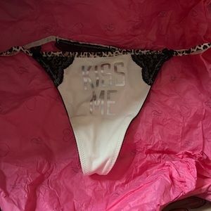 Beige cheetah print thong